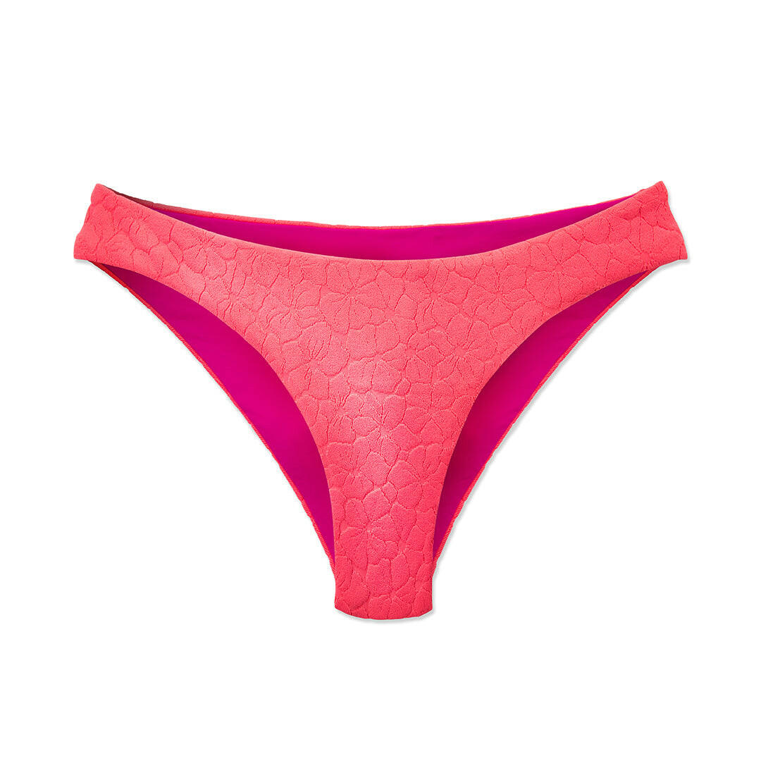 Isla De Ibiza Aubrey 經典比基尼下身以經典舒適的剪裁打造,提供適中包覆度,並以亮眼色彩展現活力魅力。