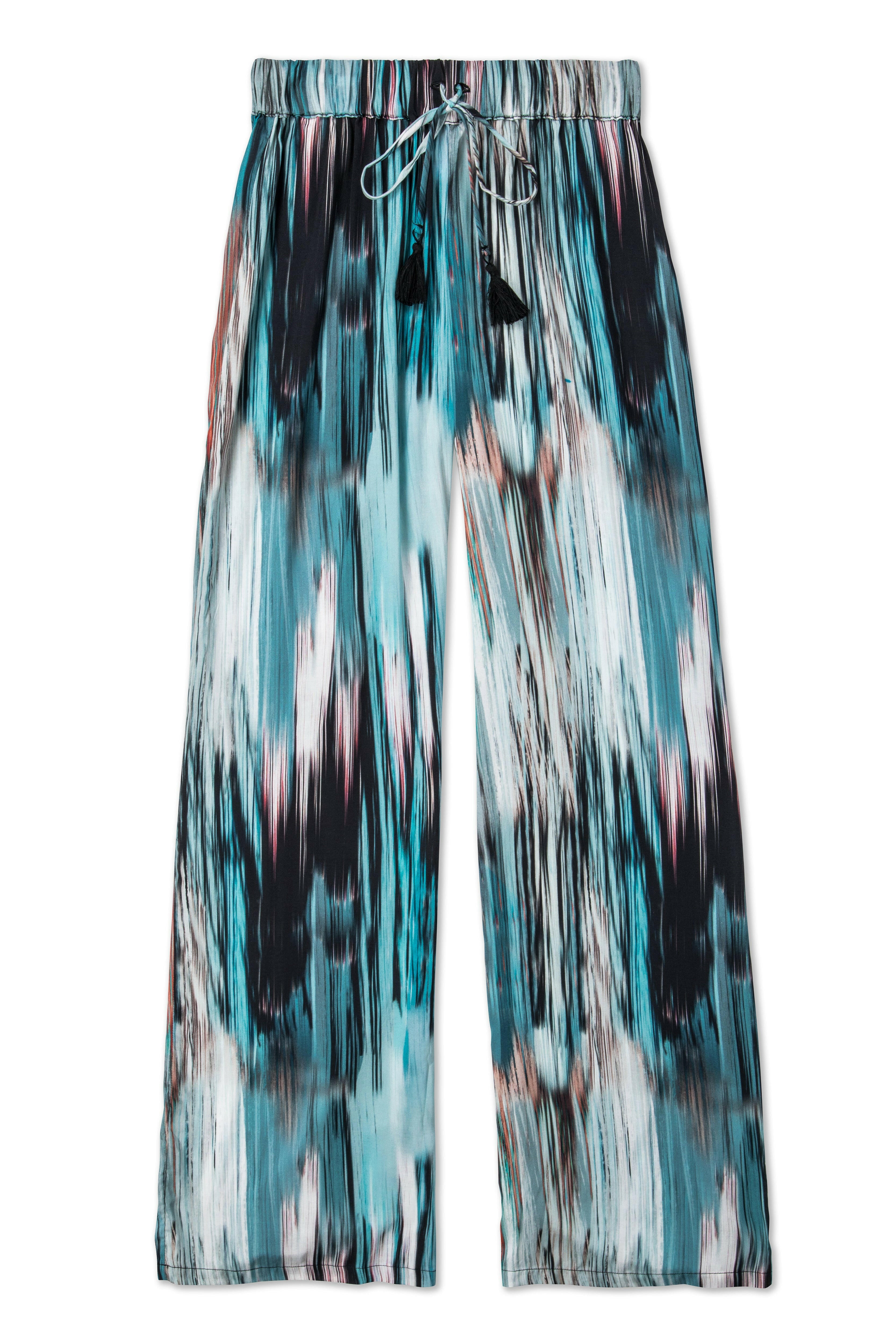 Sojin 風尚罩衫長褲為簡約寬鬆的長褲,採用柔軟舒適的面料,適合日常穿搭或休閒活動。